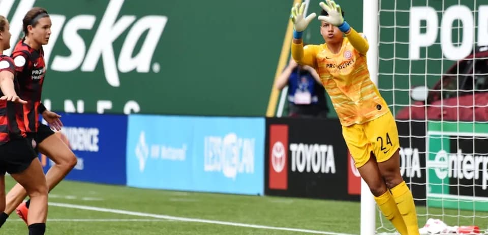 Goalkeeper making a save during match