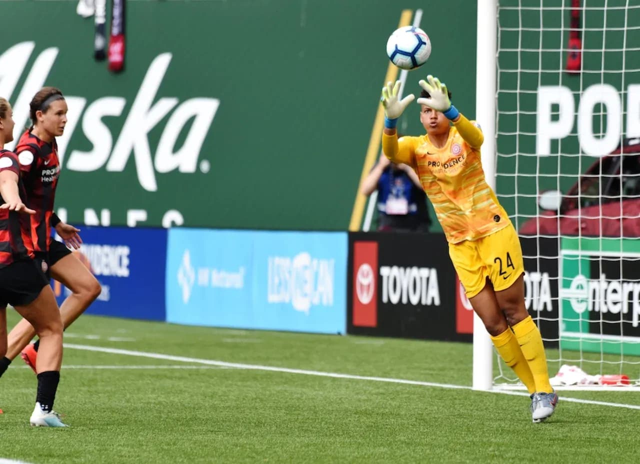 Goalkeeper making a save during match