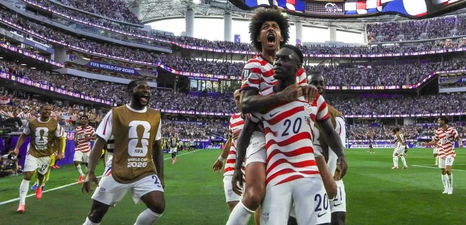 US players celebrating a goal during World Cup match