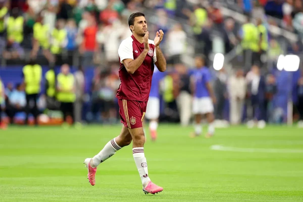 Player applauding fans after match on field