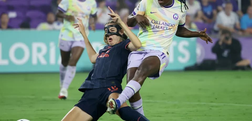 Player tackling during Bay FC vs Orlando Pride match