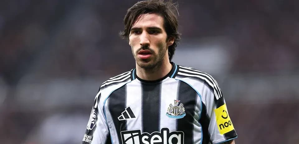 Newcastle player in striped jersey during match