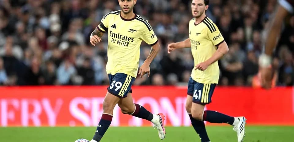Two Arsenal players on the pitch during match