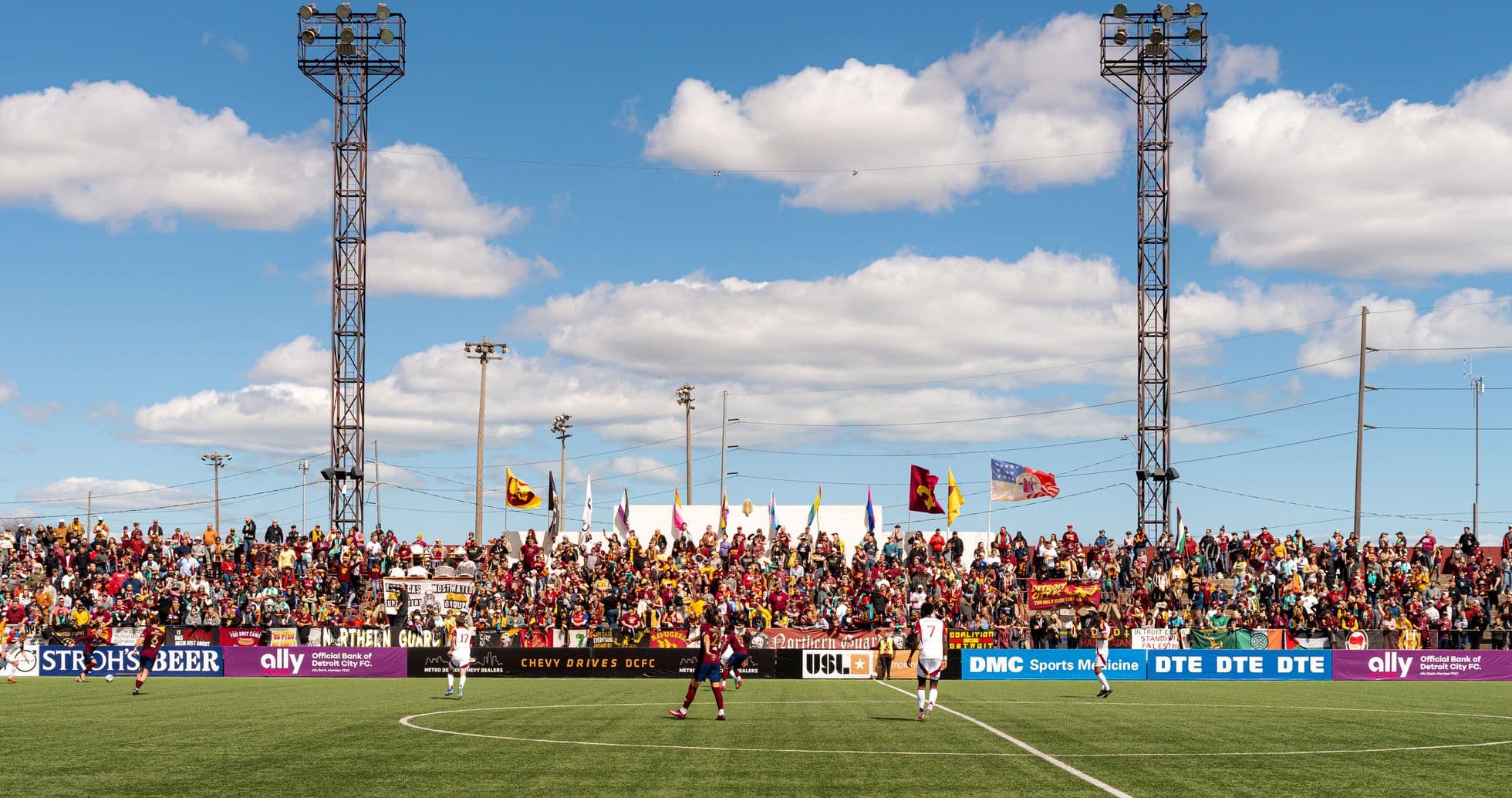 Fans cheering during Detroit City vs Lexington match