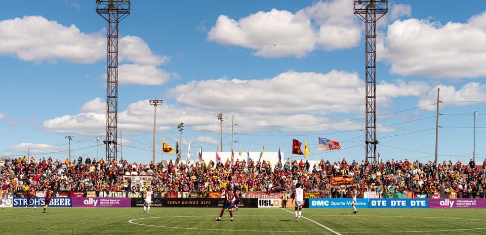 Fans cheering during Detroit City vs Lexington match