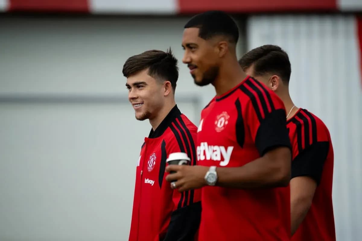 Two Manchester United players walking during training session