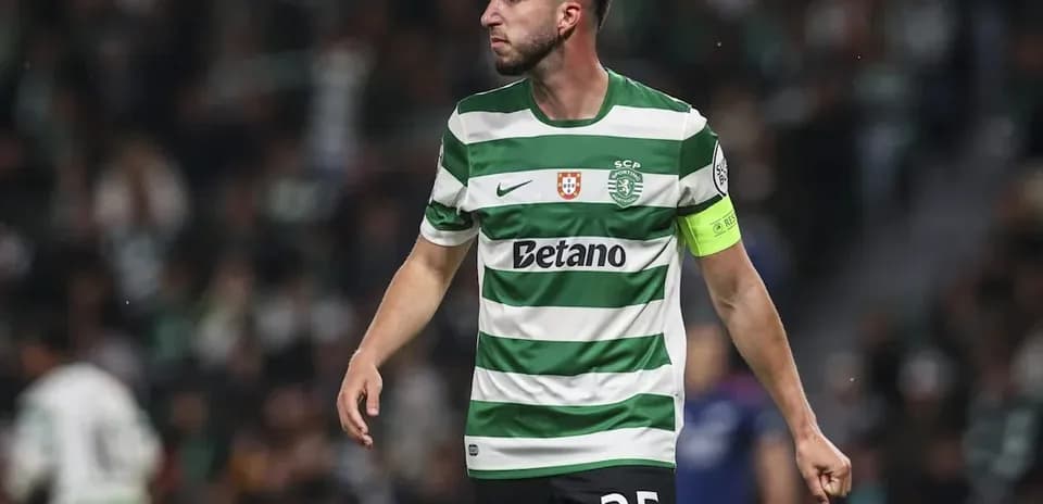 Player wearing green and white stripes during match