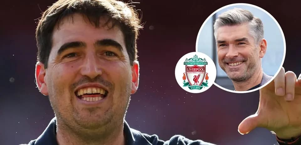 Coach celebrating with Liverpool club logo in background