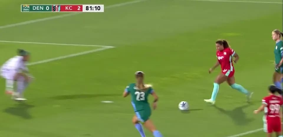Player dribbling the ball during Kansas City match