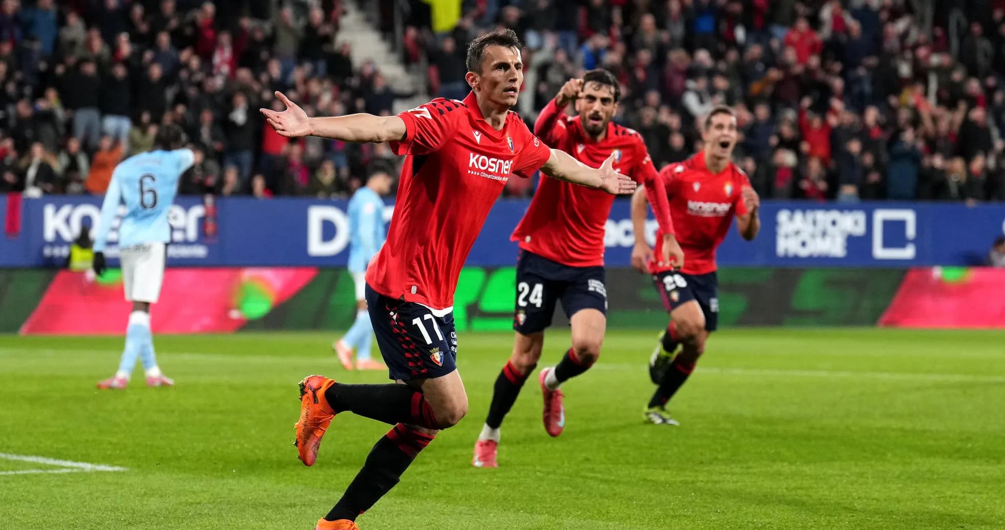 Osasuna players celebrating a goal during match