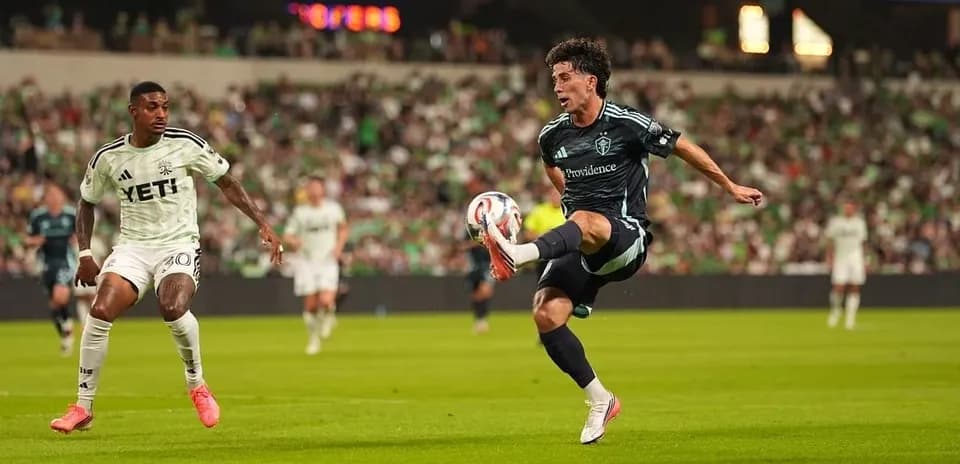 Player kicking the ball in MLS match