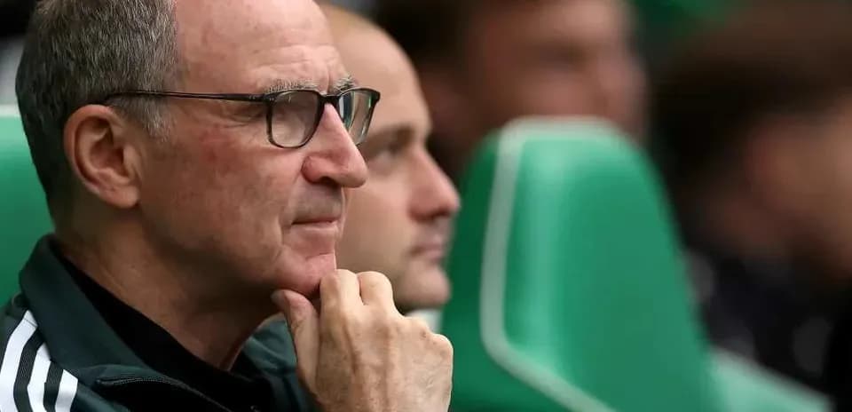 Coach observing the game from the bench