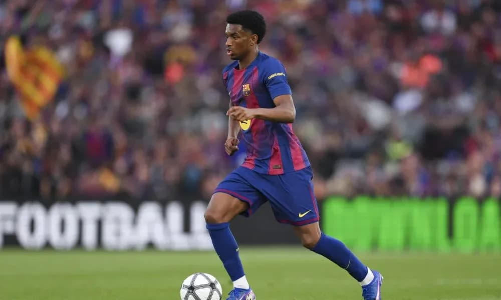 Barcelona player dribbling ball during match