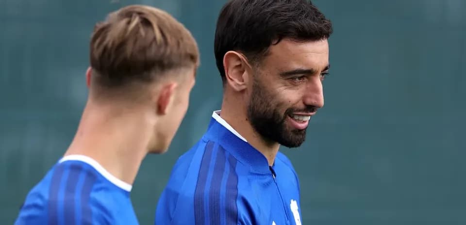 Two players talking during training session