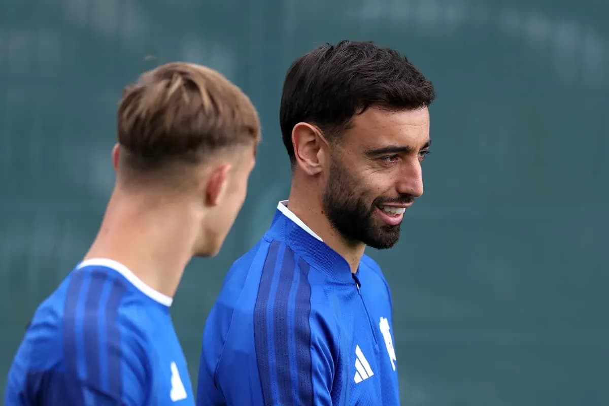 Two players talking during training session