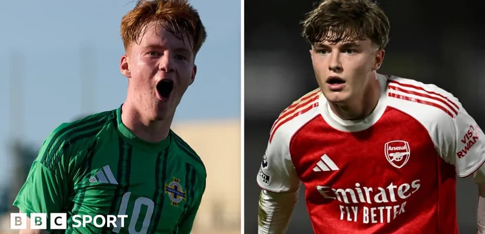 Two young football players in action poses
