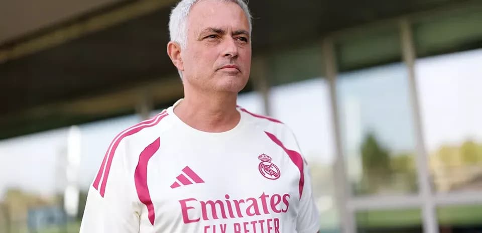 Man in Real Madrid training kit at facility