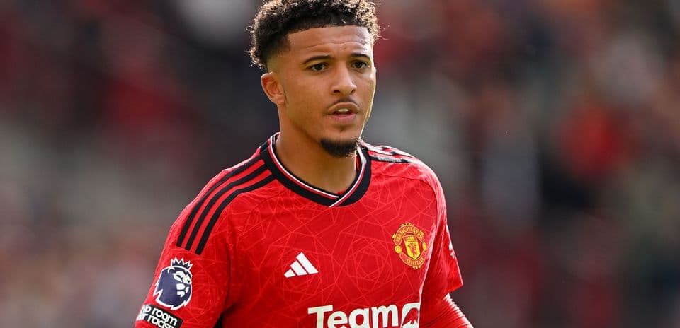Player in Manchester United jersey on the field