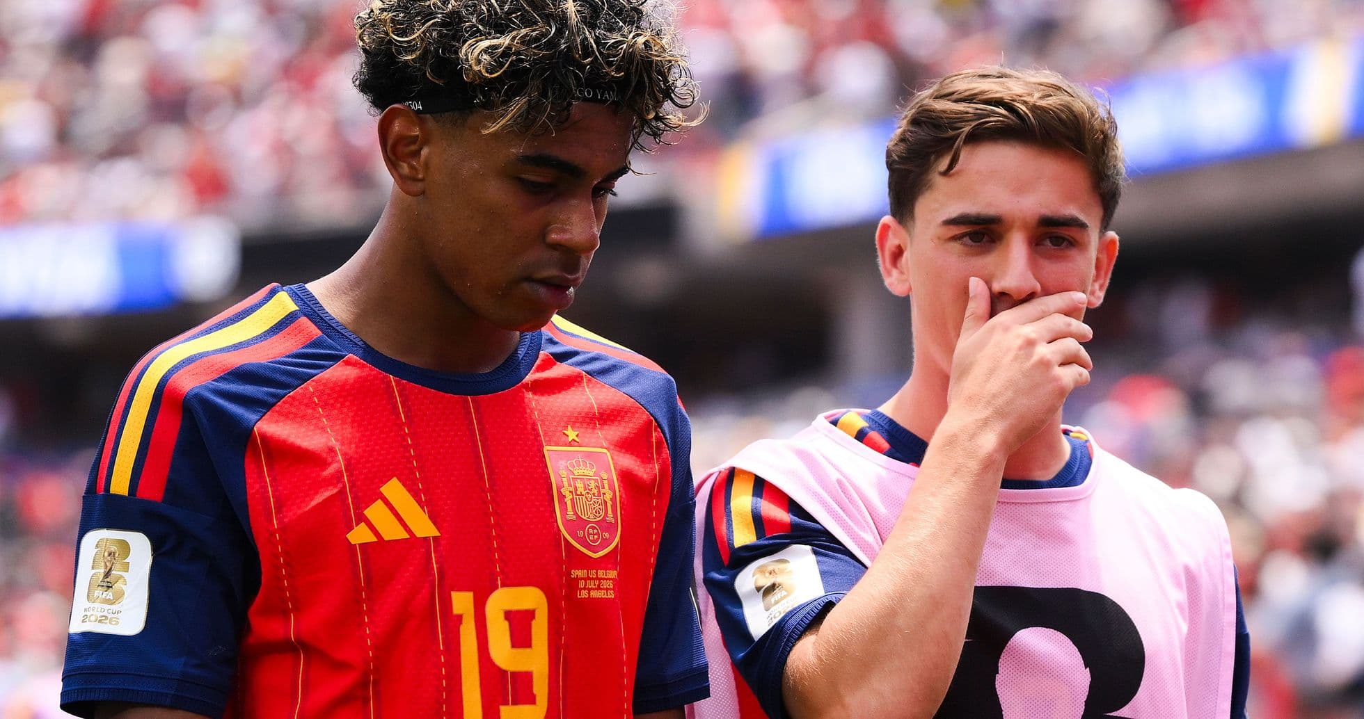 Two Spanish players discussing during a match