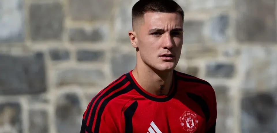 Player wearing Manchester United training kit outdoors