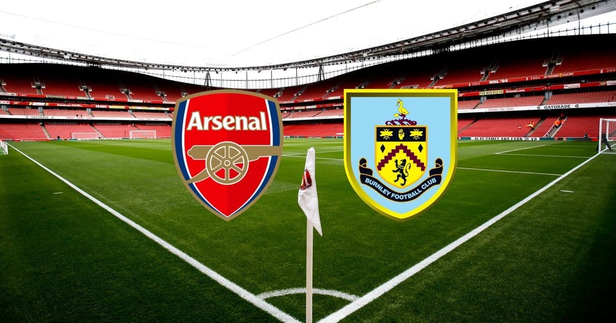 Arsenal and Burnley logos at stadium pitch