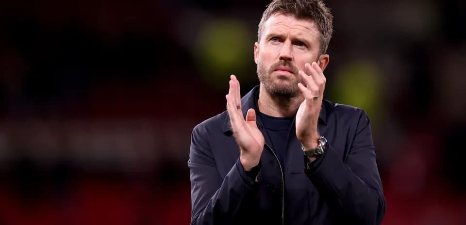 Manager applauding fans after the match