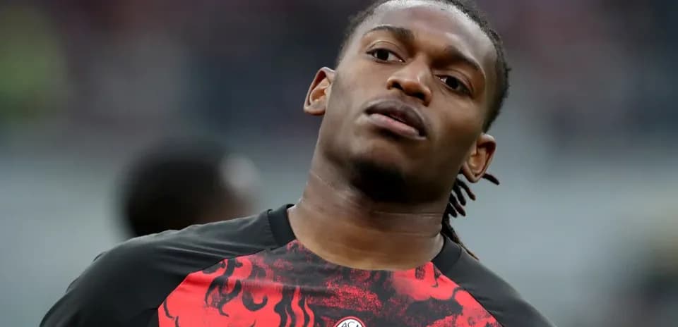 Player warming up in AC Milan training shirt