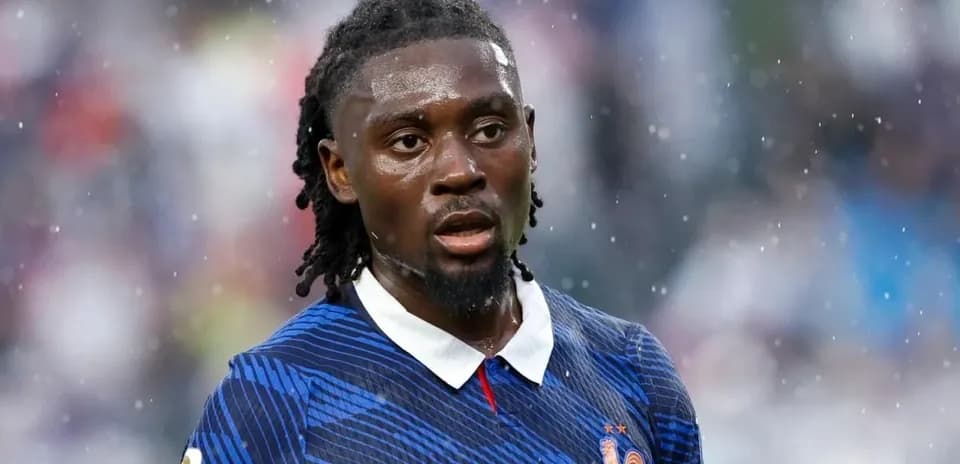 Player wearing blue France jersey during match