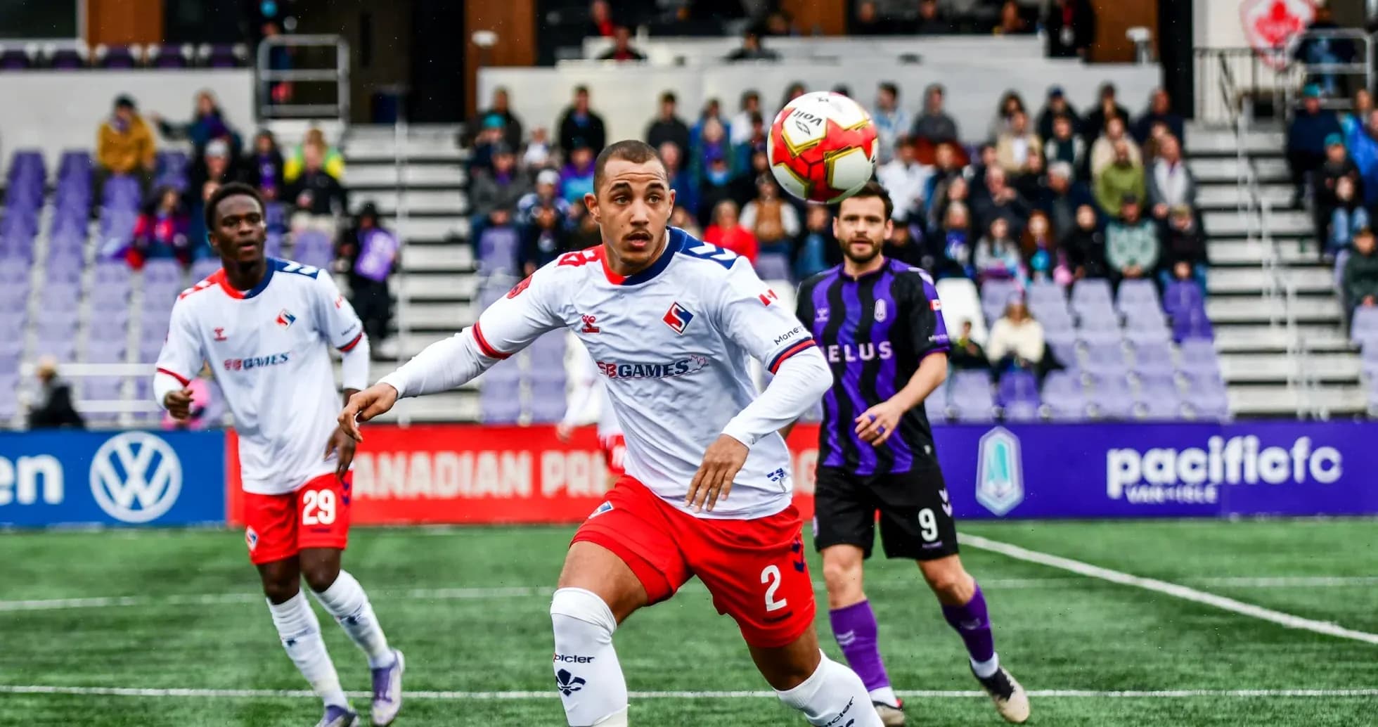 Players competing for the ball in match