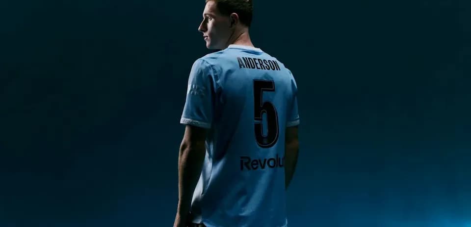 Player in light blue jersey with number 5