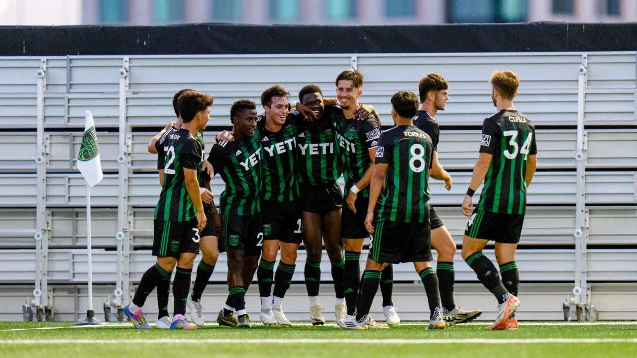 Austin II players celebrating a goal