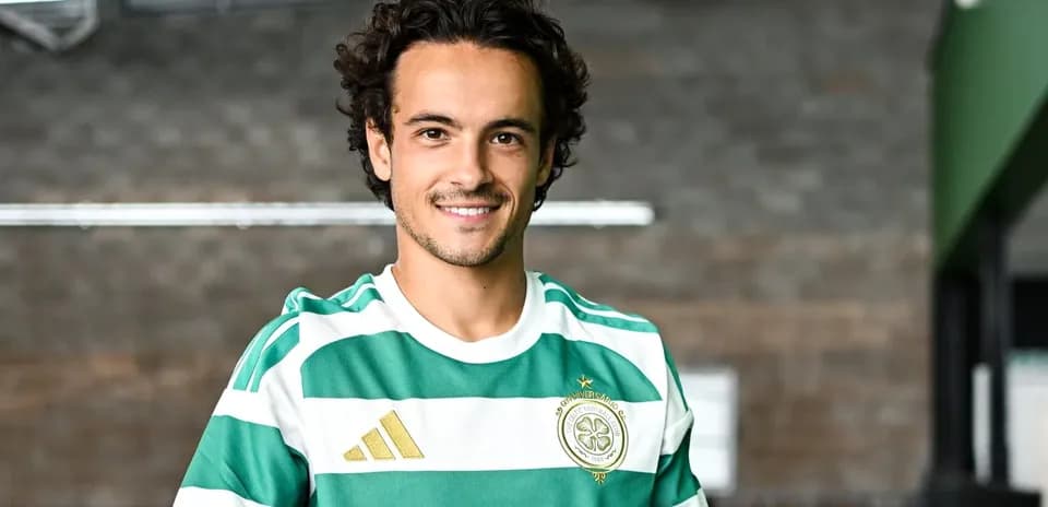 Player wearing green and white striped jersey indoors