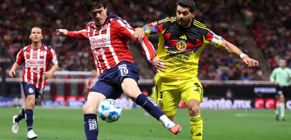 Club America player challenging Guadalajara Chivas