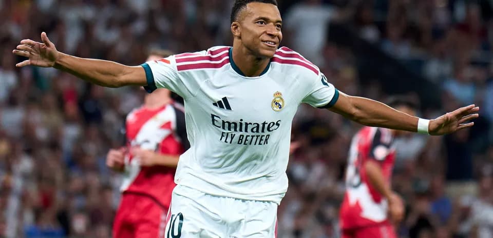 Player celebrating goal in Real Madrid jersey