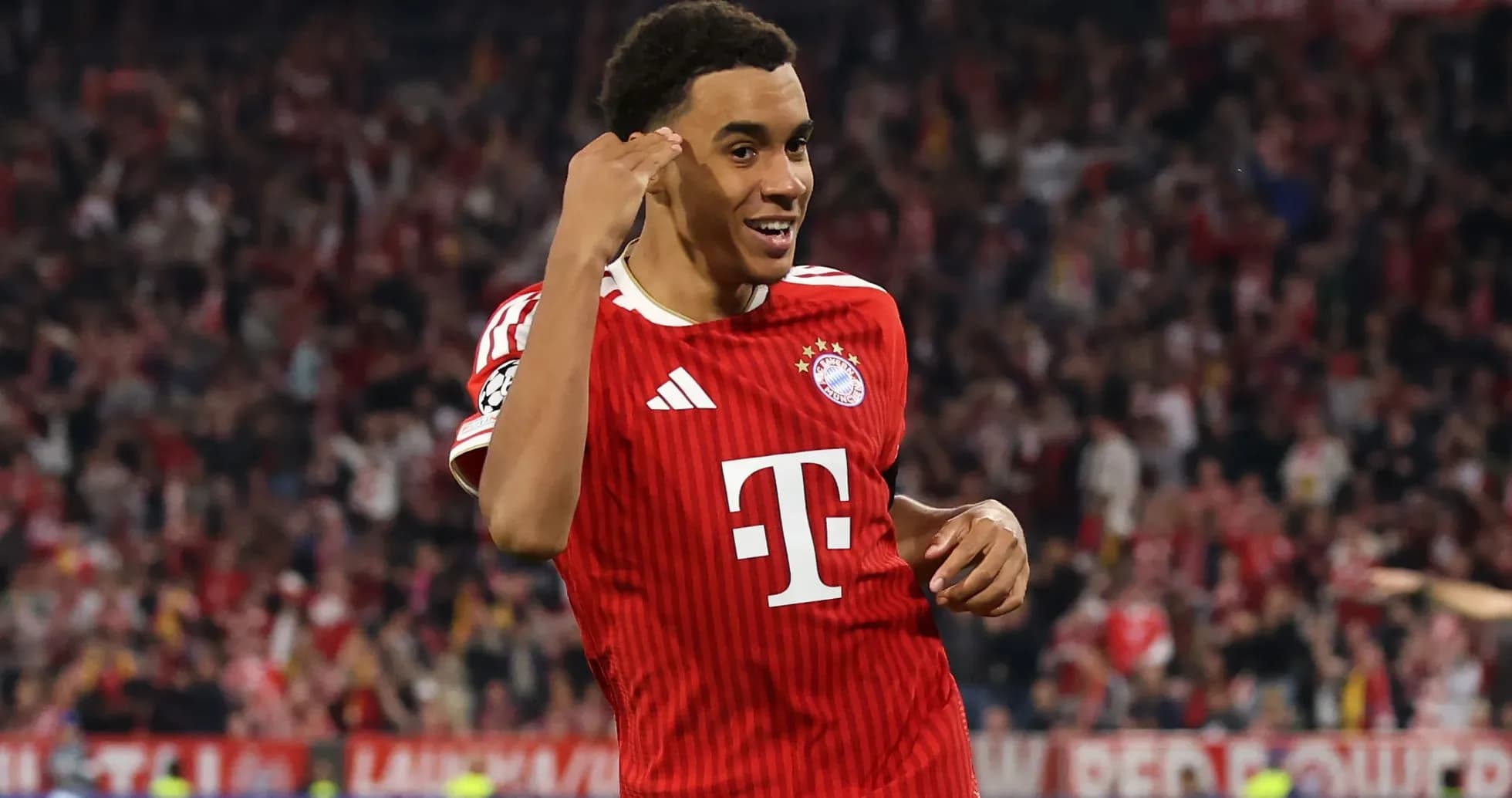 Player celebrating after scoring a goal for Bayern Munich