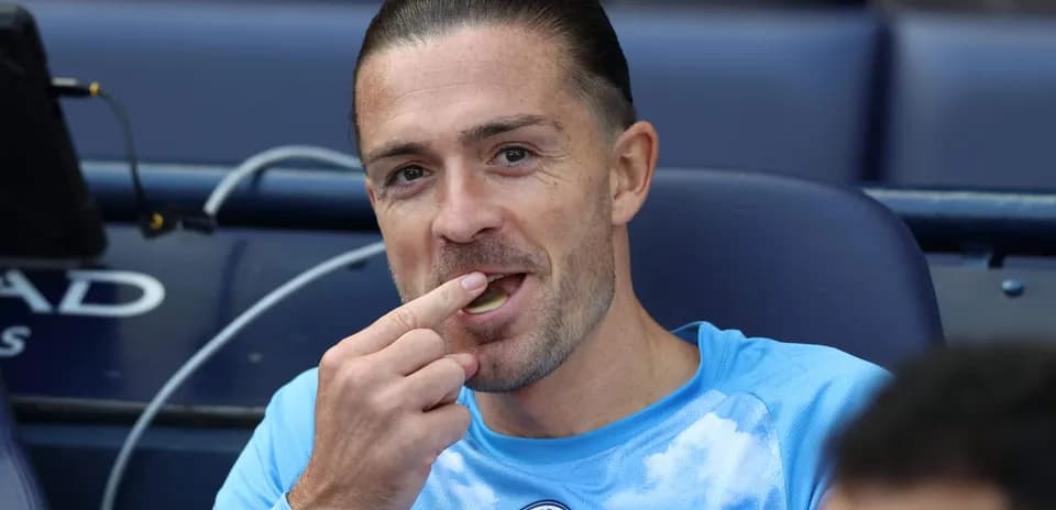 Player sitting on bench eating during match