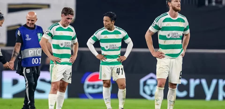 Celtic FC players walking off the pitch after match