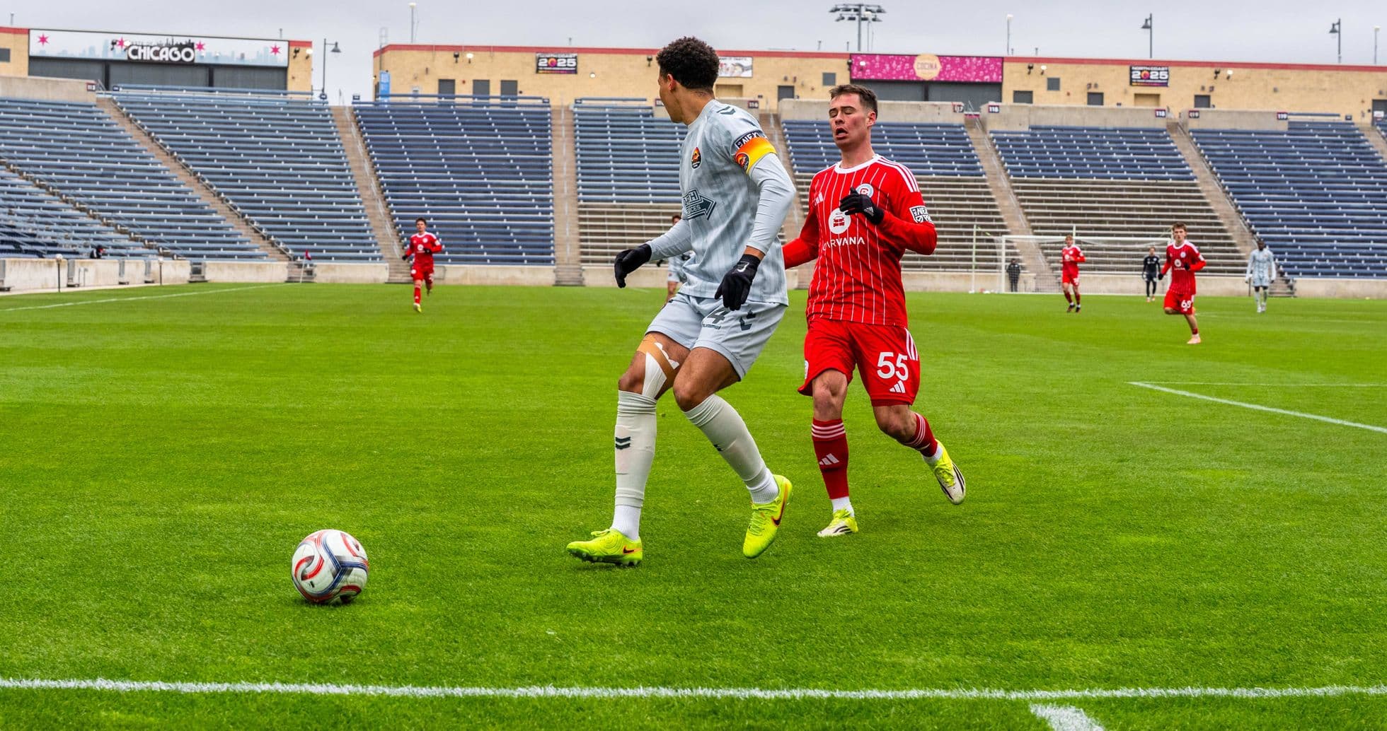 Goalkeeper preparing to pass ball during match