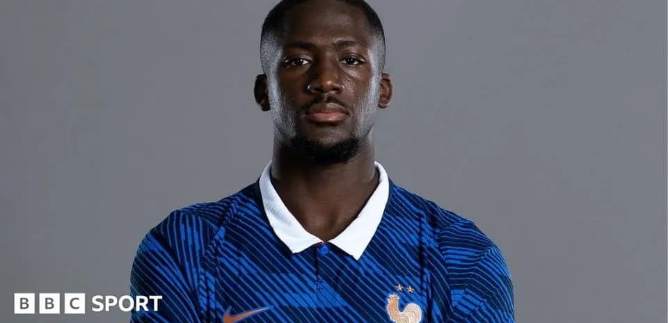 Player in France national team jersey posing