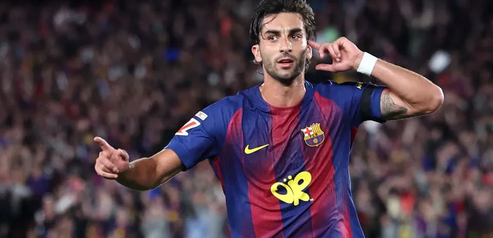 Player celebrating a goal for Barcelona in match