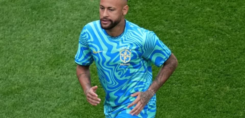 Player wearing Brazil kit running on the field