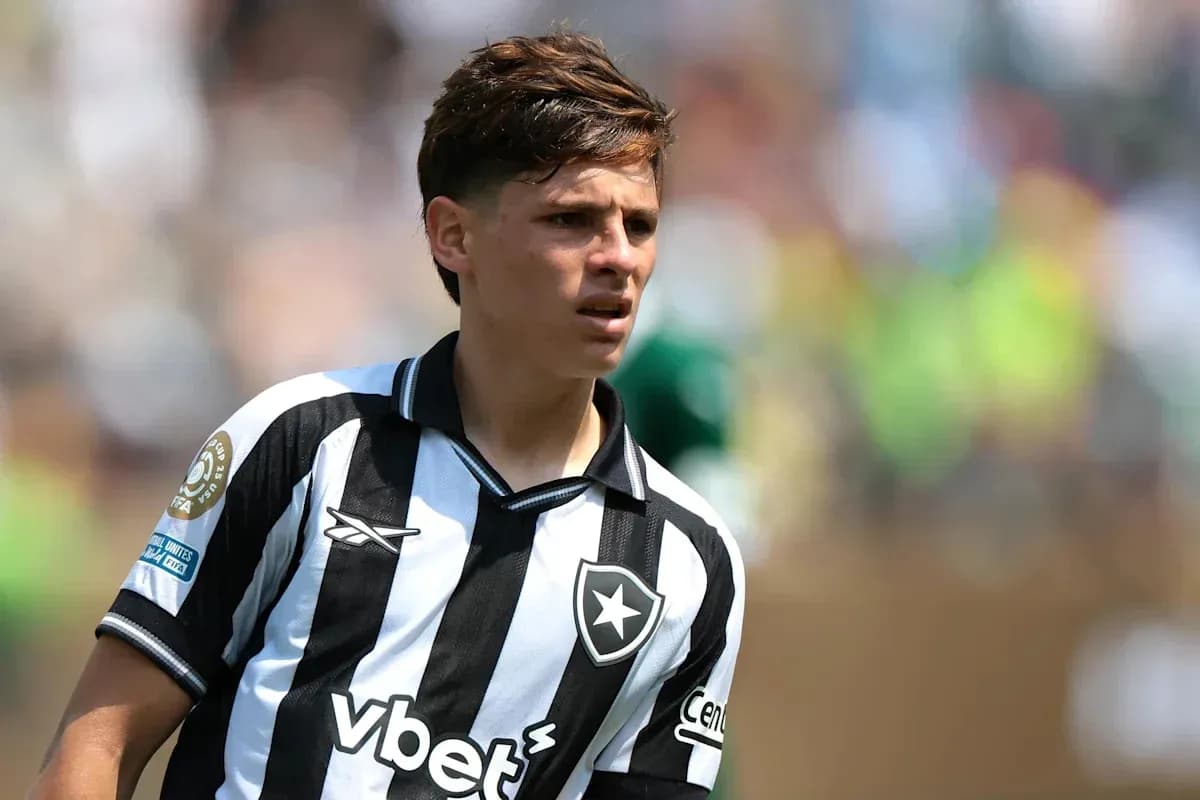 Player in black and white jersey on field