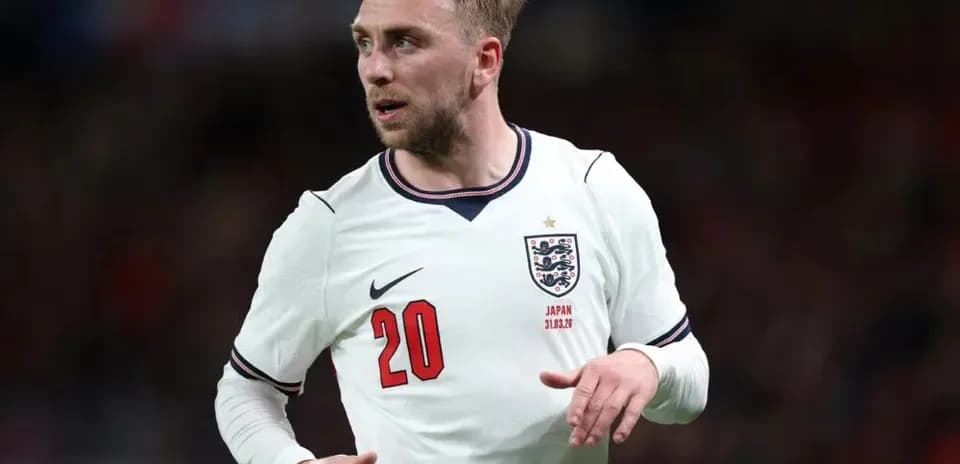 Player wearing England jersey during match action