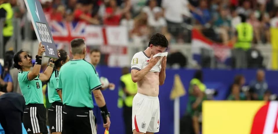Player wiping face during substitution at match