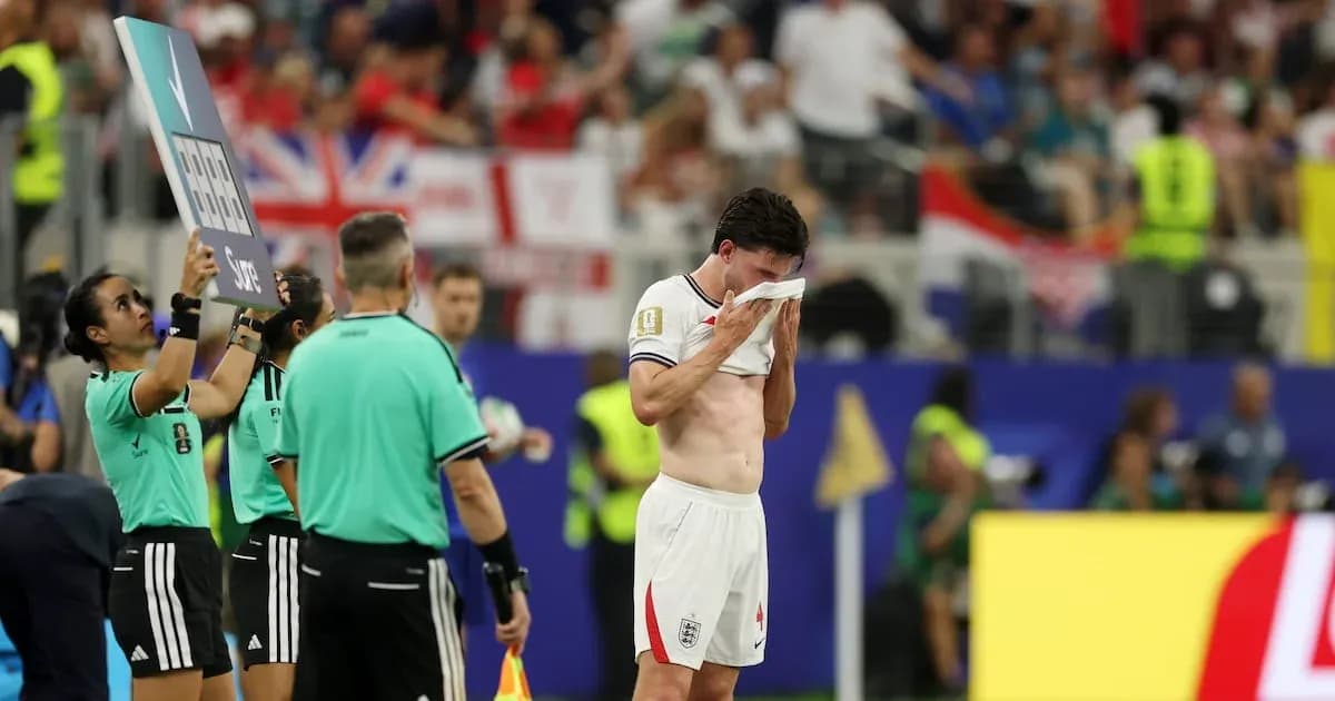 Player wiping face during substitution at match