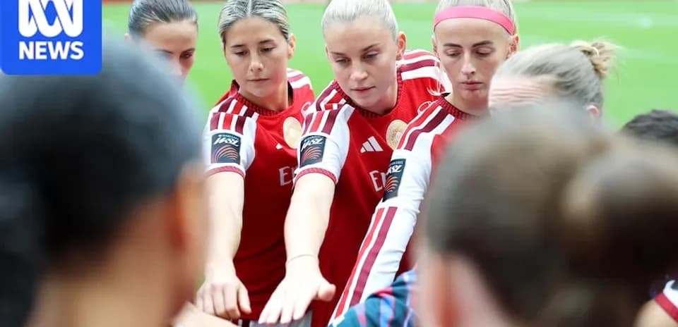 Players huddled together for team motivation before match