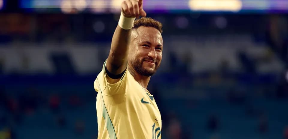 Neymar celebrating after a match, wearing Brazil jersey