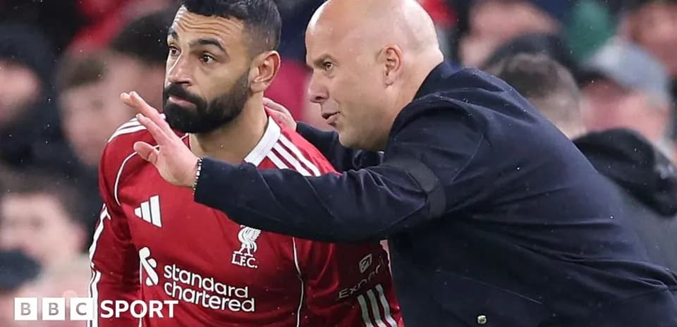 Player receiving tactical instructions from coach during match