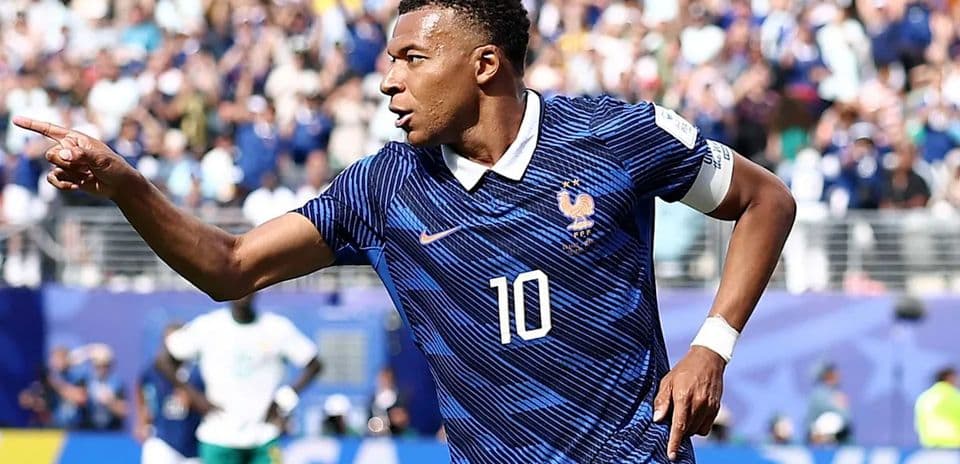Kylian Mbappe Surpasses Ronaldo's World Cup Record with Brace in France's 3-0 Victory Over Sweden