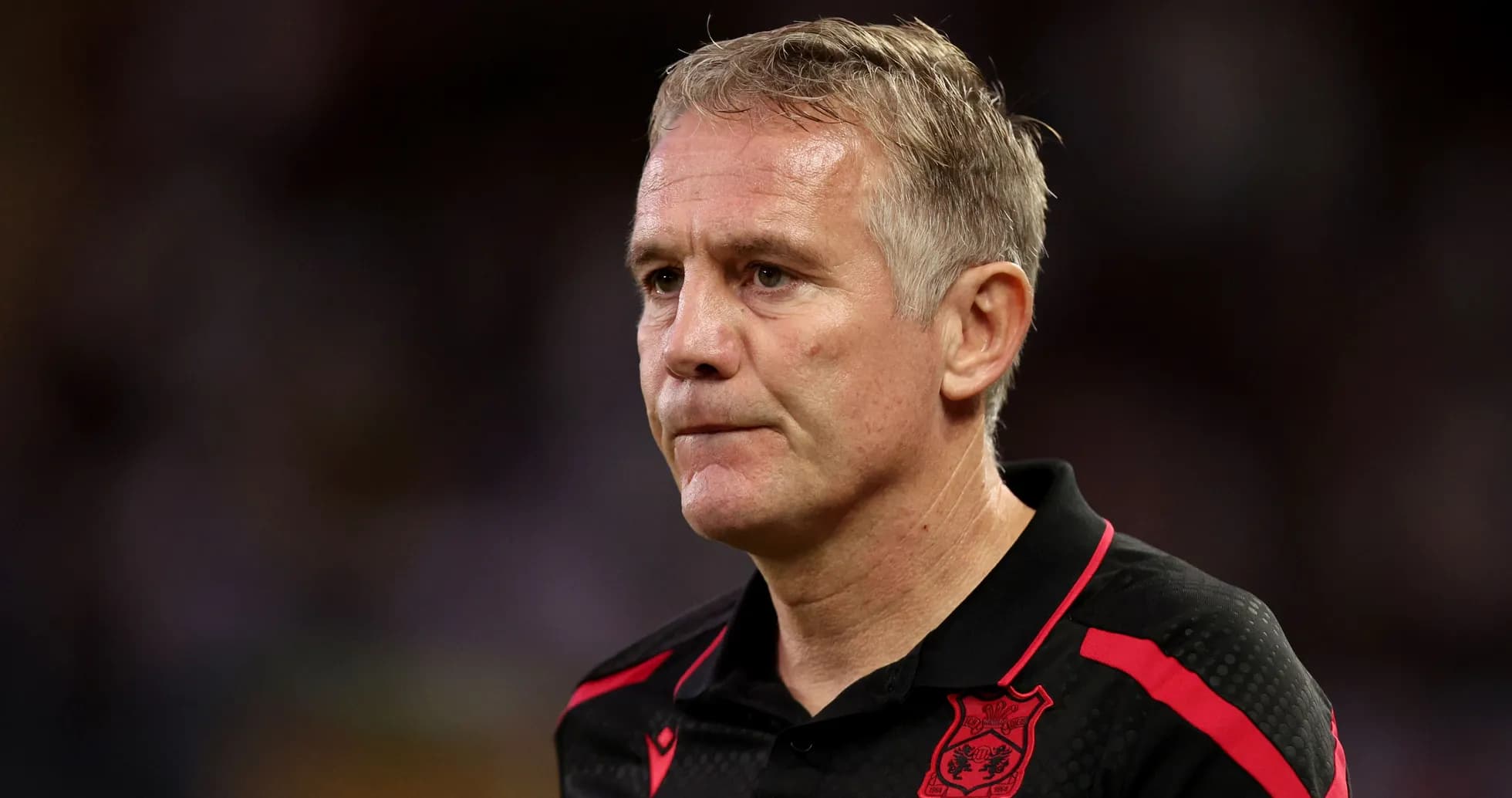 Coach in black shirt during match moment Coach in black shirt during match moment